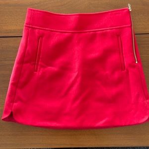 J.Crew Skirt. Color Red, Size 6….zipper side Closure.